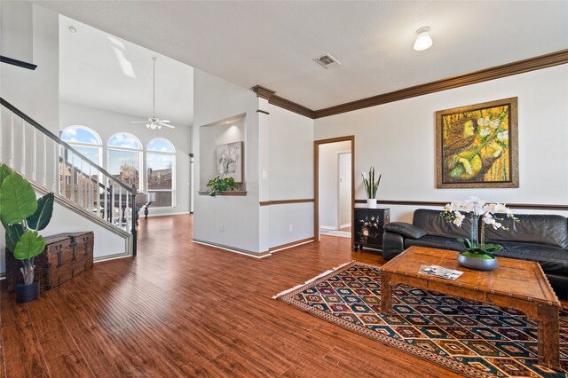 living room featuring hardwood / wood-style floors and ornamental molding