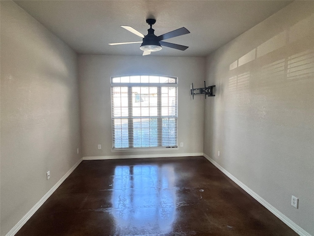 unfurnished room featuring ceiling fan