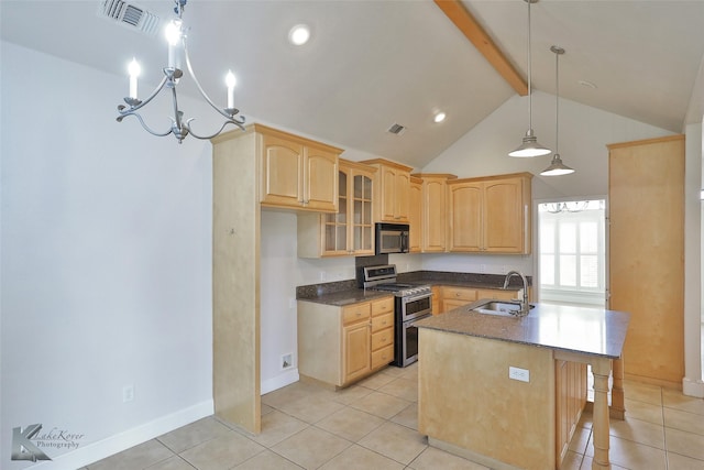 kitchen featuring light brown cabinetry, sink, and double oven range