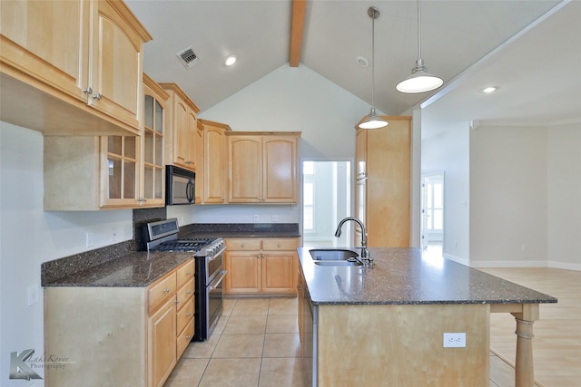 kitchen with sink, light brown cabinets, beamed ceiling, double oven range, and decorative light fixtures