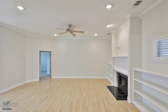 unfurnished living room with light wood-type flooring, ceiling fan, and crown molding