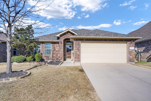 ranch-style home featuring a garage and a front yard