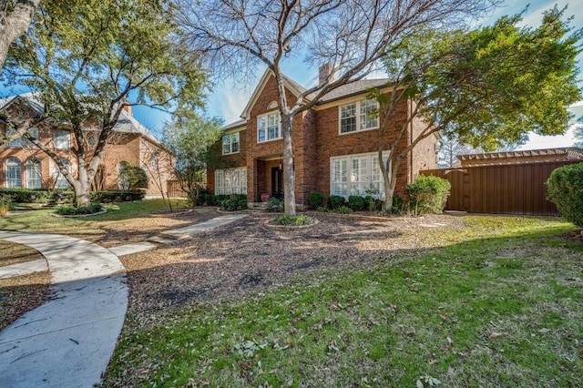 view of front of property with a front lawn