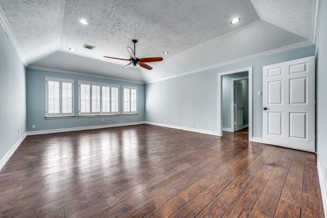 interior space with ceiling fan, dark wood-type flooring, crown molding, a textured ceiling, and lofted ceiling