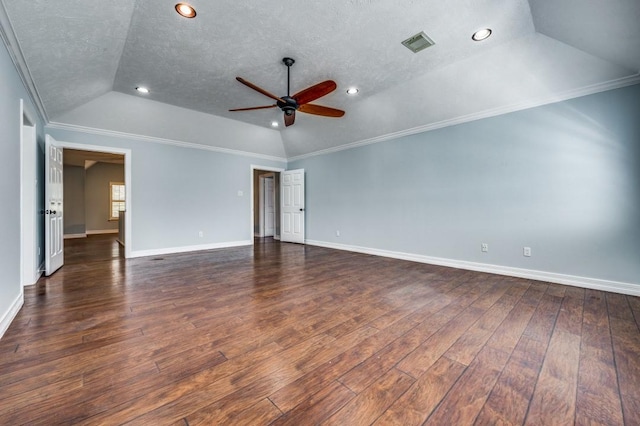 empty room with ceiling fan, dark wood-type flooring, a textured ceiling, and vaulted ceiling