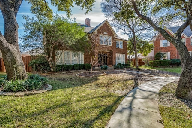 view of front of home featuring a front yard