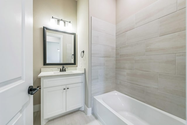 bathroom featuring vanity and shower / bathtub combination