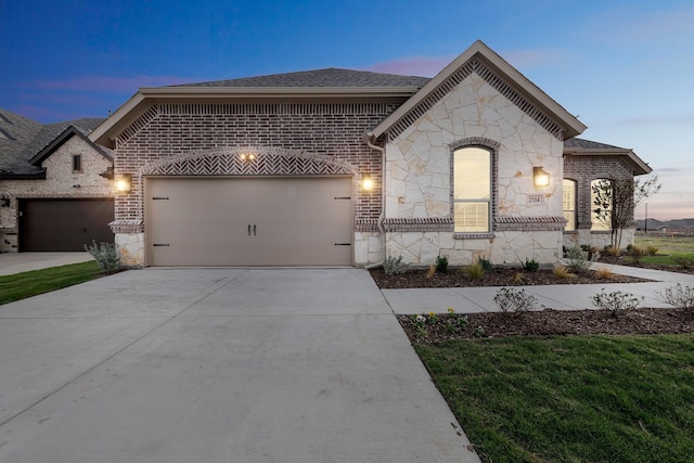 view of front of home with a garage