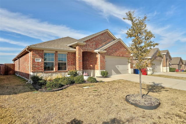 ranch-style home with driveway, brick siding, a garage, and a shingled roof
