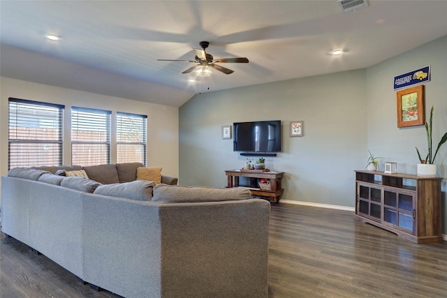 living room with ceiling fan, lofted ceiling, and dark hardwood / wood-style flooring