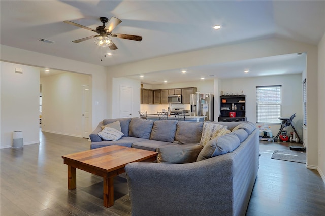 living area with visible vents, baseboards, dark wood-style floors, ceiling fan, and recessed lighting