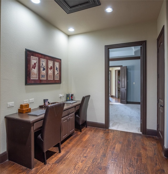 office space with dark hardwood / wood-style flooring