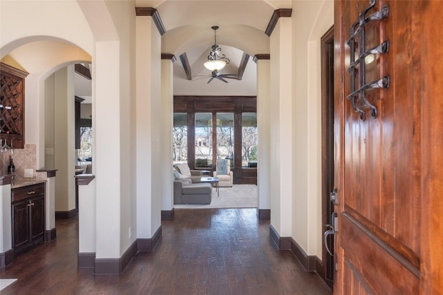 foyer with dark hardwood / wood-style flooring