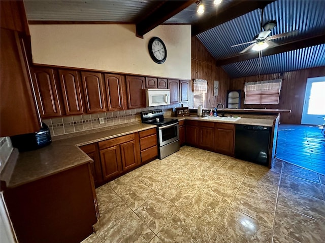 kitchen with kitchen peninsula, sink, lofted ceiling with beams, black dishwasher, and stainless steel electric range oven