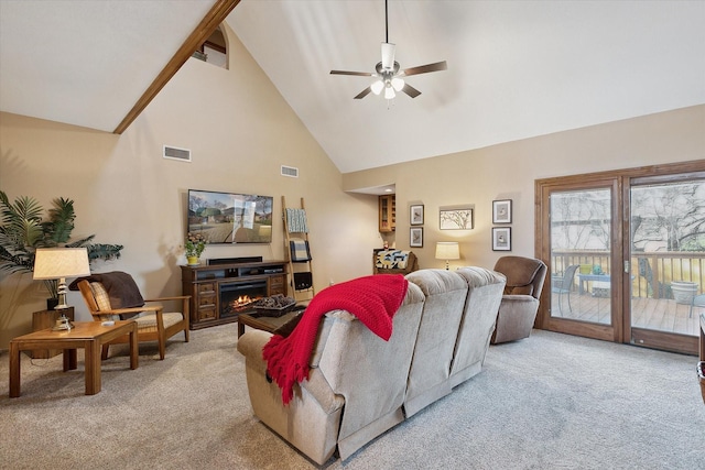 carpeted living room featuring high vaulted ceiling, beamed ceiling, and ceiling fan