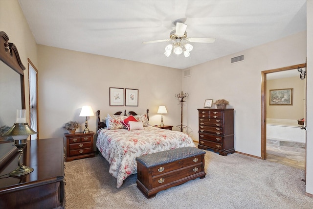 carpeted bedroom with ceiling fan and connected bathroom