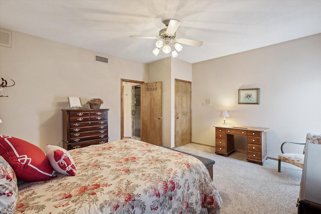 bedroom with light carpet and ceiling fan