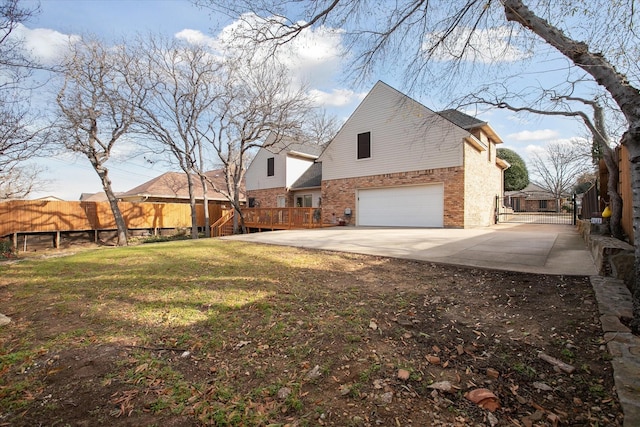 exterior space featuring a front yard and a garage