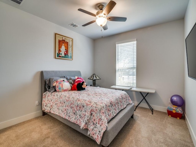 bedroom featuring ceiling fan and light colored carpet