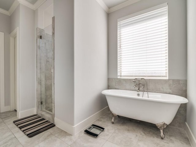 bathroom featuring separate shower and tub, tile patterned floors, and ornamental molding