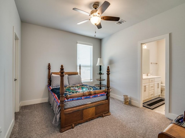 bedroom featuring carpet flooring, connected bathroom, ceiling fan, and sink