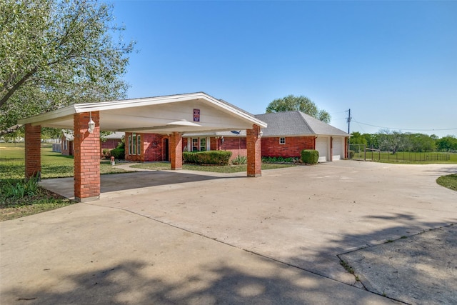 single story home featuring a garage