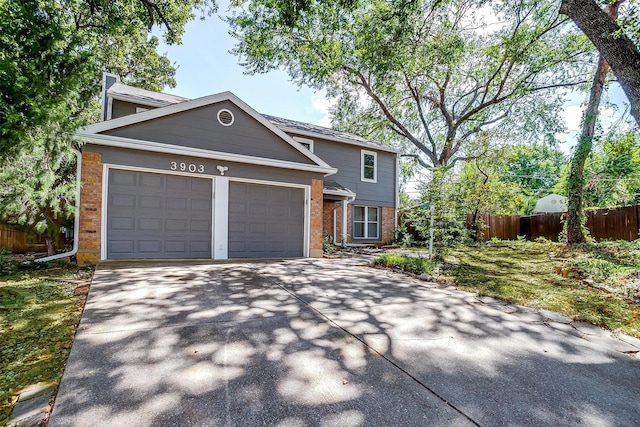 front of property with a garage