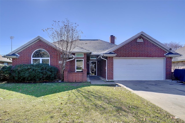 view of front facade featuring a front yard and a garage