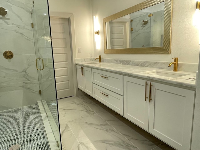 bathroom with vanity and an enclosed shower