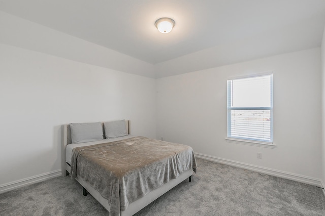 bedroom with light carpet