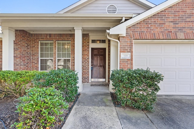 entrance to property with a garage