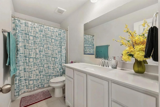 full bathroom featuring tile patterned flooring, vanity, toilet, and shower / bathtub combination with curtain