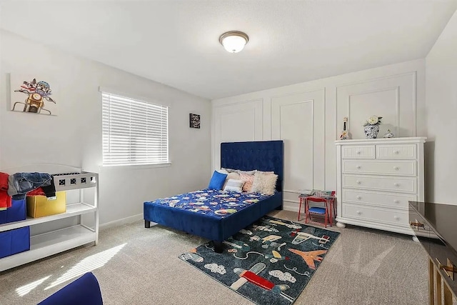 bedroom featuring carpet