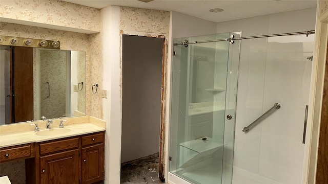 bathroom featuring vanity and walk in shower