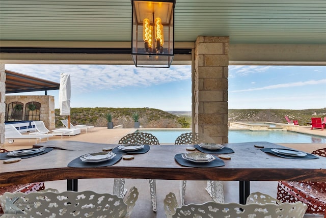 dining area with a chandelier