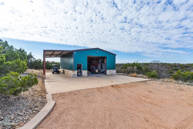 view of outbuilding with a garage