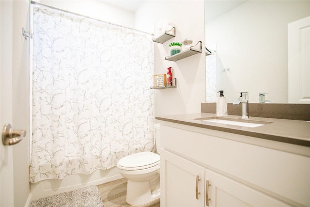 full bathroom with vanity, toilet, shower / bathtub combination with curtain, and wood-type flooring