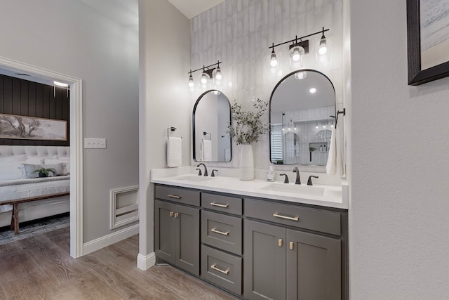 bathroom with vanity and wood-type flooring