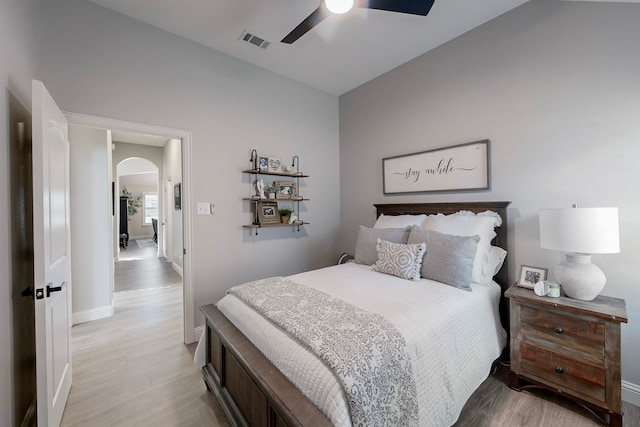 bedroom with light wood-type flooring and ceiling fan