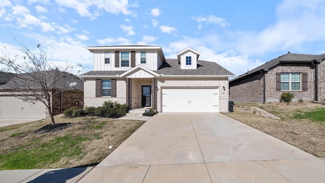 view of front of property with a garage