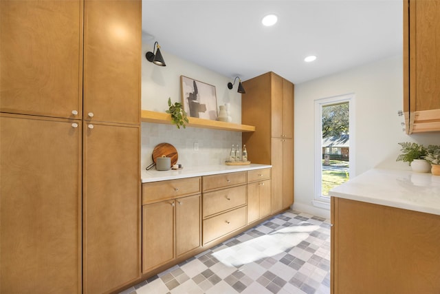 kitchen featuring tasteful backsplash