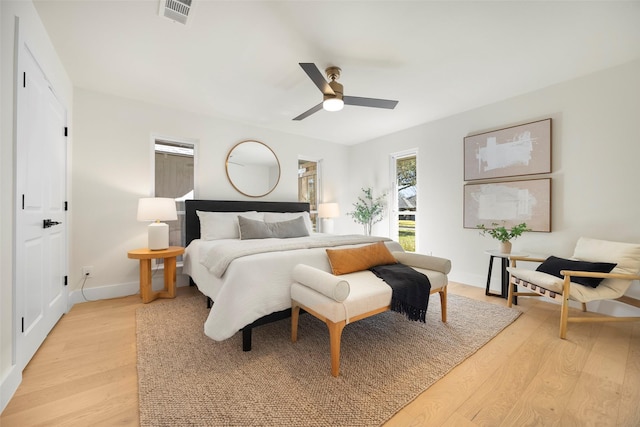 bedroom featuring ceiling fan and light wood-type flooring