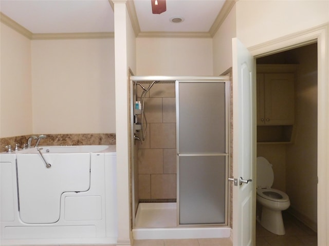 bathroom with tile patterned floors, a shower with door, ornamental molding, and toilet