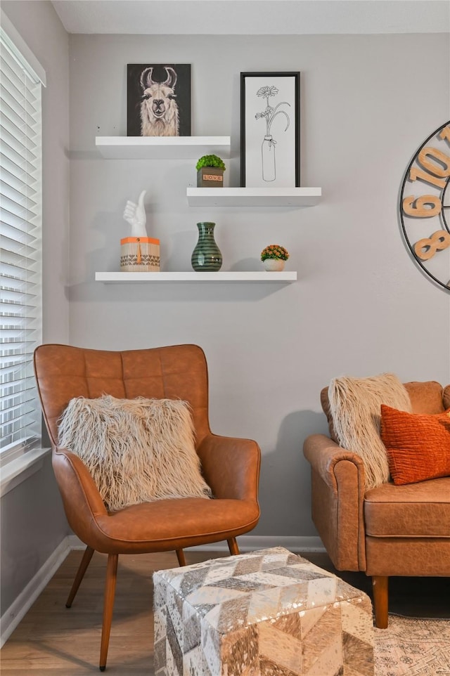 sitting room with hardwood / wood-style floors