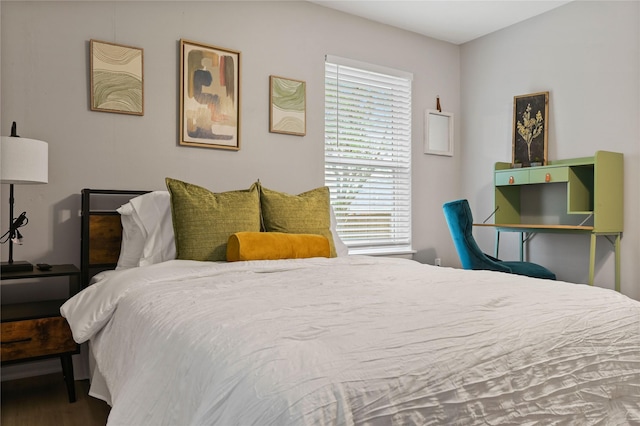 bedroom featuring hardwood / wood-style floors