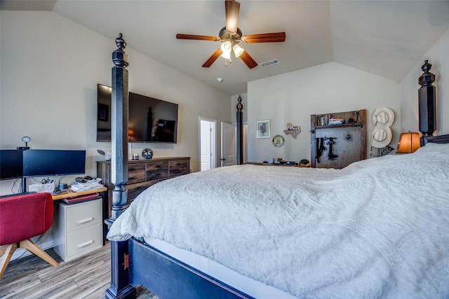 bedroom with lofted ceiling, ceiling fan, and light hardwood / wood-style floors