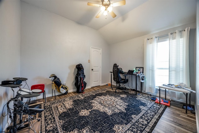 interior space with hardwood / wood-style flooring, vaulted ceiling, and ceiling fan