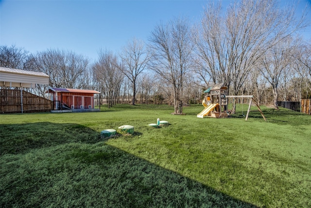 view of yard with a playground