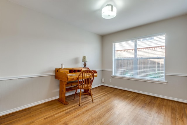 home office with light wood-type flooring