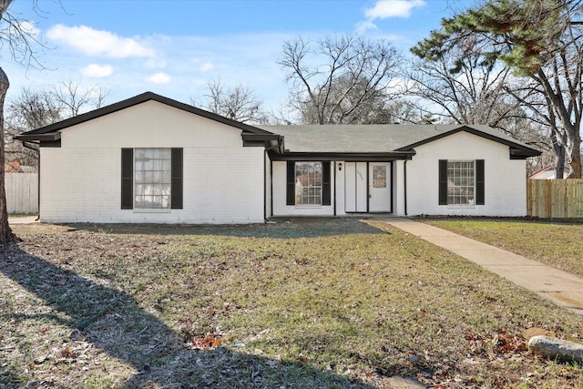 ranch-style house with a front yard